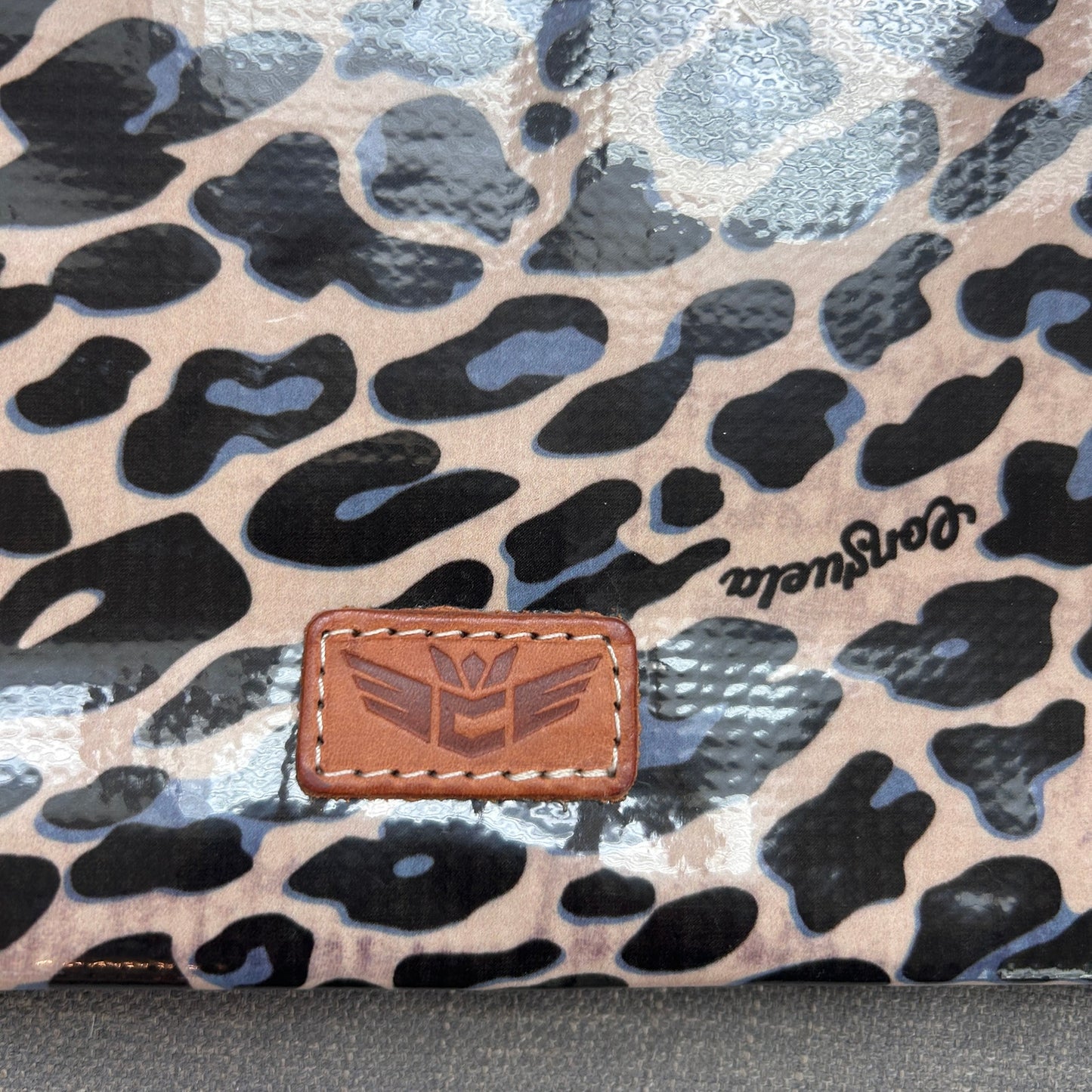 Consuela Blue Jag Downtown Crossbody Animal Print Woven Strap Patent Leather